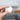 Person holding access control RFID coin tag