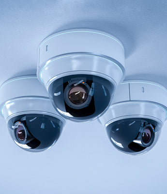 Variety of CCTV security cameras installed on exterior building