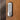silver combination lock with numeric keypad installed on brown wooden door