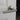 silver passage lock on white wooden interior door
